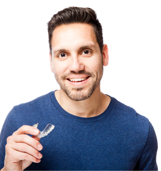 man holding clear aligner